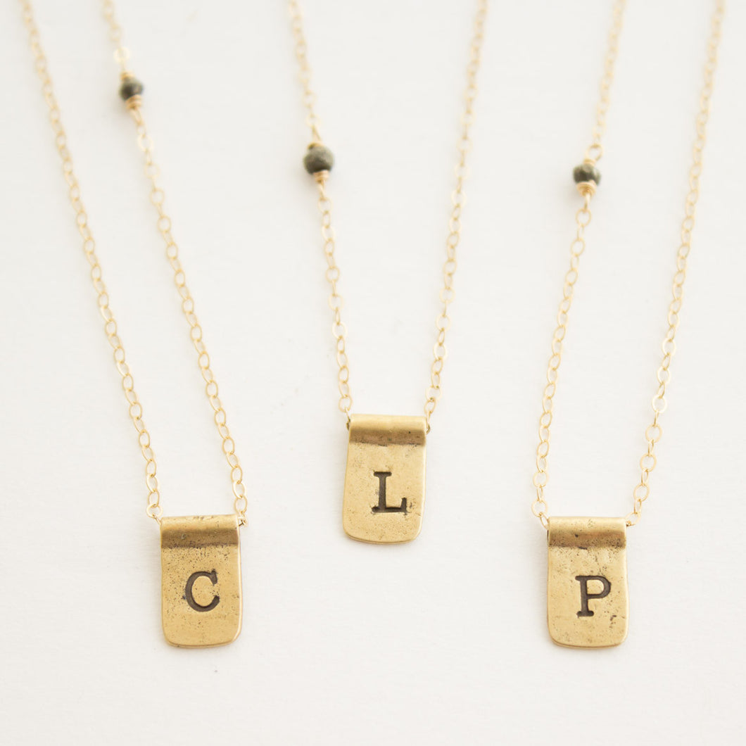 TAB LETTER NECKLACE